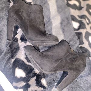 Black suede ankle booties.